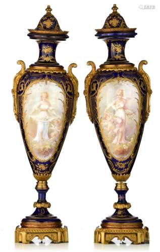 A pair of oblong Sèvres vases and covers, signed and marked,...