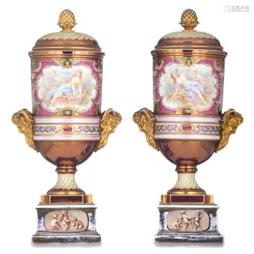 A fine pair of Vienna type porcelain vases and covers, the r...