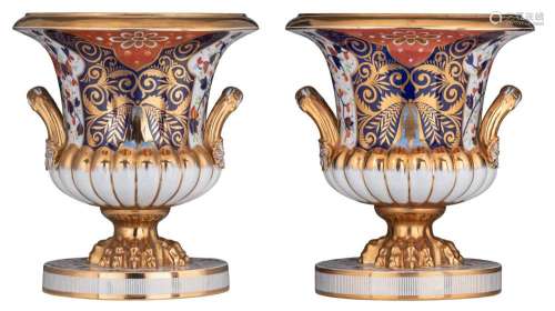 An imposing pair of campana shaped vases, with an Imari desi...
