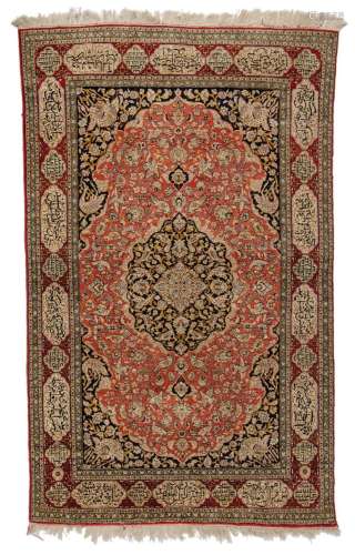 An Iran Ghoum carpet, floral decorated with birds, the borde...