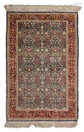 A signed Turkish Hereke millefleurs rug, silk on silk, 103,5...