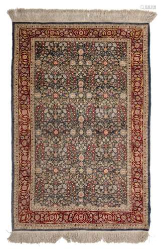 A signed Turkish Hereke millefleurs rug, silk on silk, 103,5...