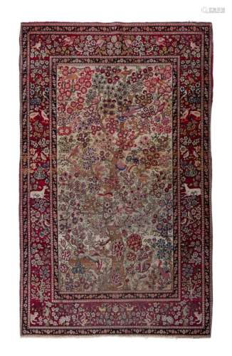 An antique Persian Ispahan rug, depicting the tree of life, ...