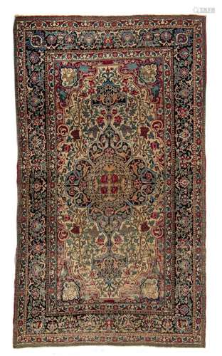 An Antique Persian Ispahan rug, decorated with birds and dee...