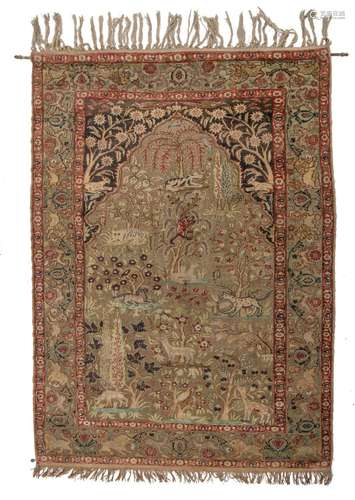 A Turkish rug, depicting the tree of life, silk on silk with...