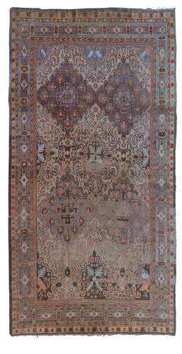 An Oriental carpet, Samarkand, wool, with decorative pattern...