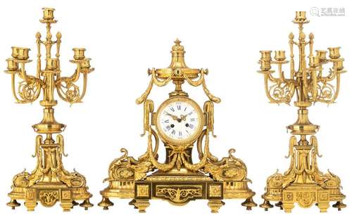 A fine gilt bronze Neoclassical three-piece clock garniture,...