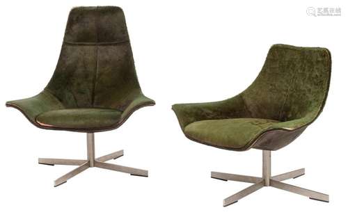 A set of two '2leather chairs', designed by Rodolfo ...