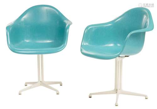 A pair of blue Eames 'DAL' (dining armchair Lafonda ...