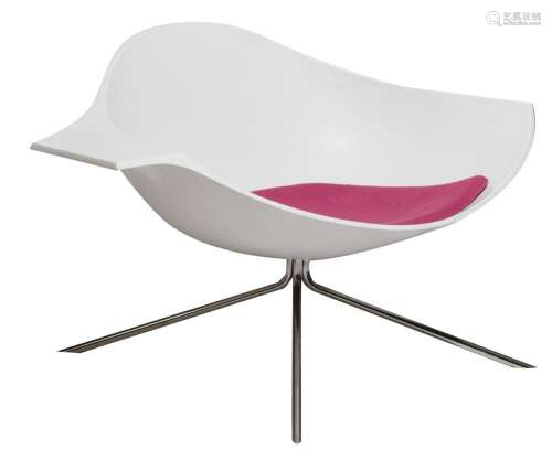 A white 'Low Lotus' chair, designed by Roy Scheemake...