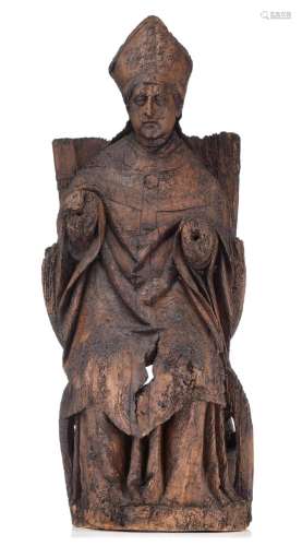 An impressive oak sculpture of an enthroned Bishop, 16thC, H...