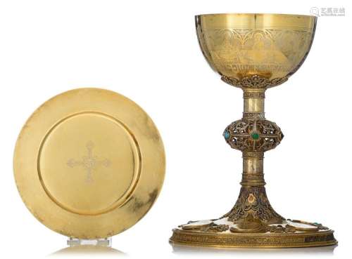 A richly decorated gilt silver chalice and paten made by Van...