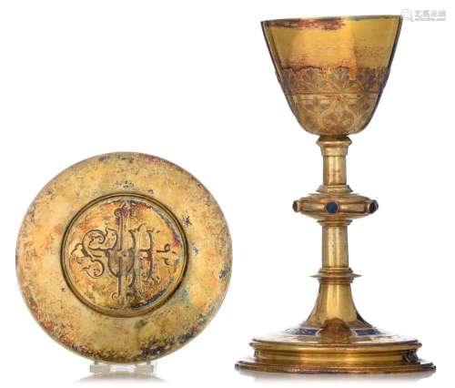 An early 20thC French export gilt silver chalice and paten, ...
