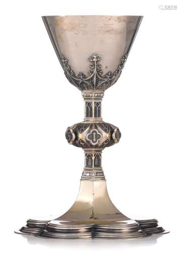 A German 800/000 silver gothic Revival chalice, sold by Bour...