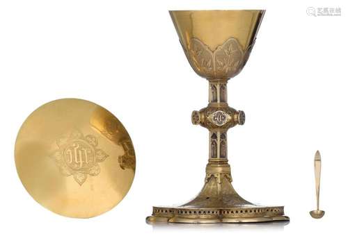 A silver and gilt silver Gothic Revival chalice and paten, m...