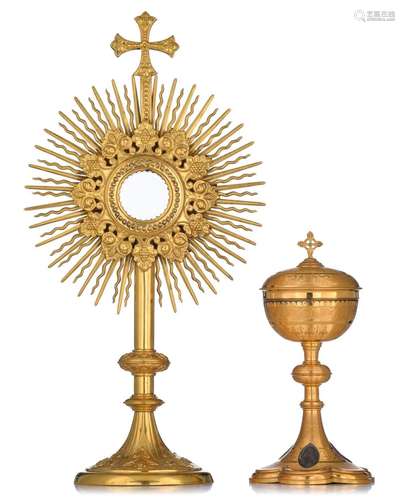 A 20thC Gothic Revival gilt brass solar monstrance, H 50 cm;...