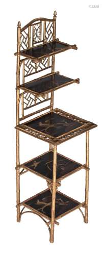 A Napoleon III chinoiserie bamboo 'étagère', with a ...