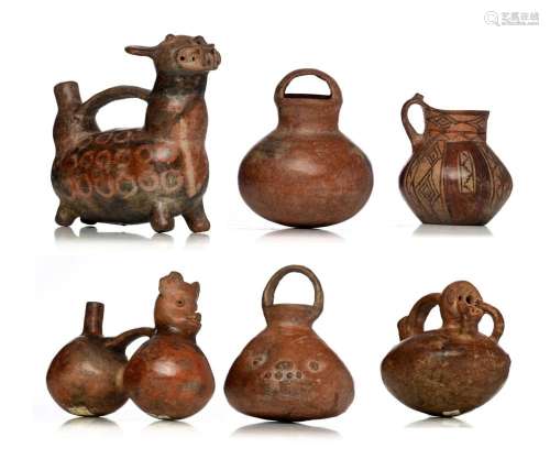 A collection of various Pre-Columbian type ceramic objects, ...
