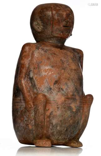 A ceramic polychrome painted seated figure vessel, Narino cu...