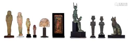 A collection of 10 Egyptian works of art in various material...
