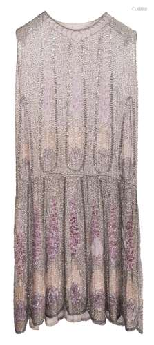 A 1920's cocktail dress, decorated with sequins and bead...