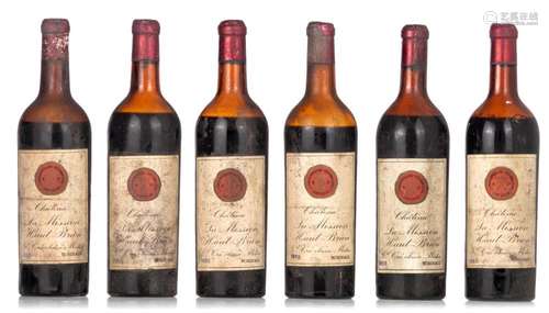 A collection of six bottles 'Château La Mission Haut Bri...