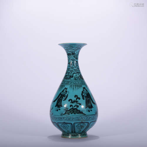 A blue glazed pear-shaped vase
