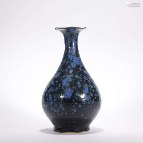 A black ground pear-shaped vase