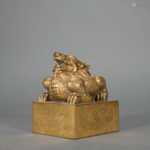 A gilt-bronze 'beast' seal