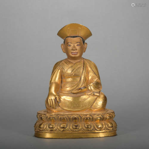 A gilt-bronze statue of guru