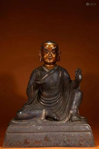 A Bronze with Silver Inlay Enlightened Monk Statue