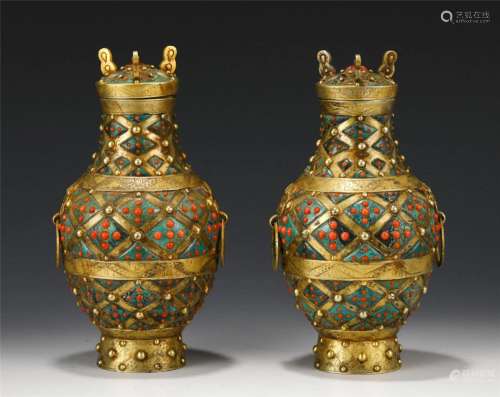 A Pair of Gilt Gold Vases