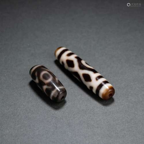 Two Pieces Of Dzi Bead