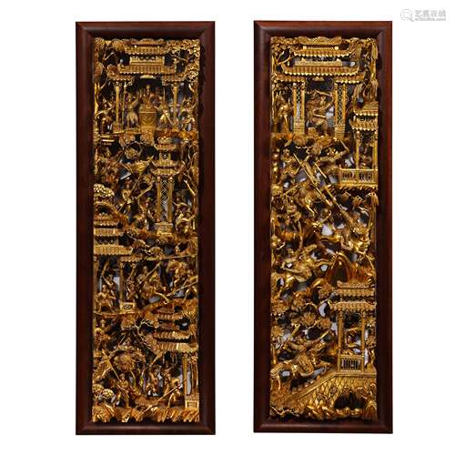 A PAIR OF QING DYNASTY WOOD HOLLOW LACQUER SWORDSMAN HANGING...