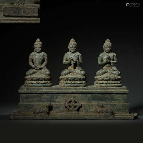 A SET OF PERSIAN BRONZE BUDDHA STATUES