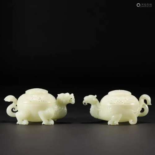 A PAIR OF CHINESE CELADON JADE DRAGON INCENSE CAGES