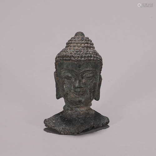 A copper buddha head