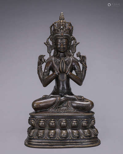 A copper silver-inlaid Guanyin bodhisattva statue