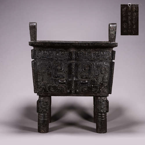 A taotie patterned double-eared bronze pot