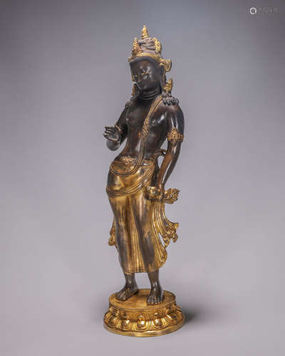 A gilding copper buddha statue