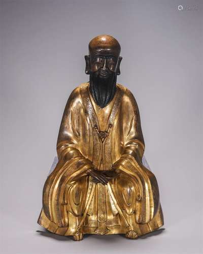 A gilding copper buddha statue