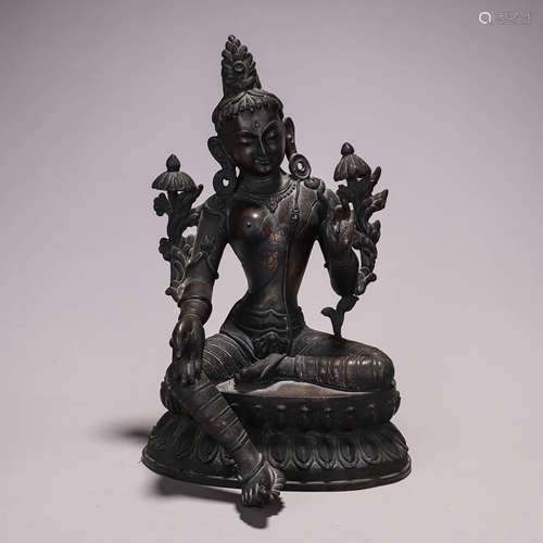 A copper green tara buddha statue