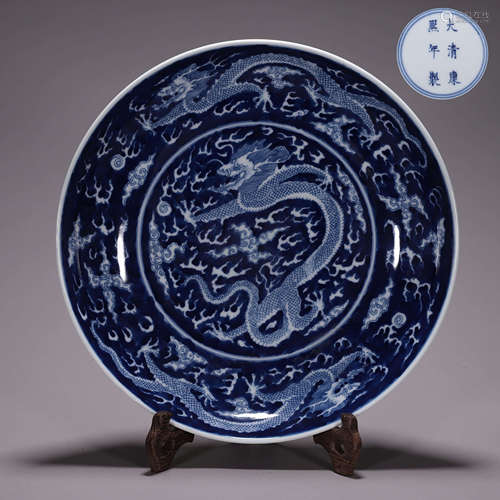 A blue and white cloud and dragon porcelain plate