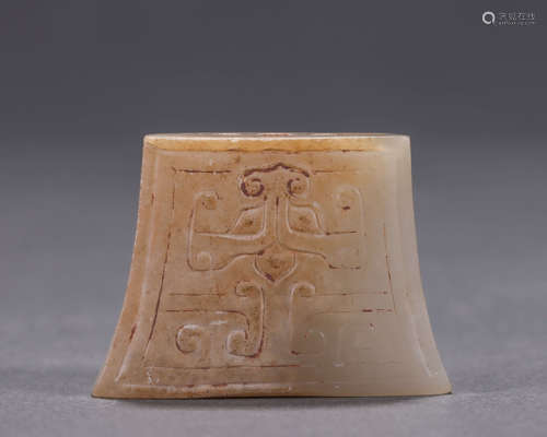 A taotie patterned Hetian jade sword ornament