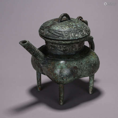 A dragon patterned bronze pot