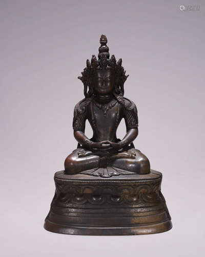 A copper Guanyin bodhisattva statue