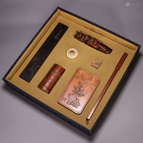 A group of red sandalwood and bamboo study sets