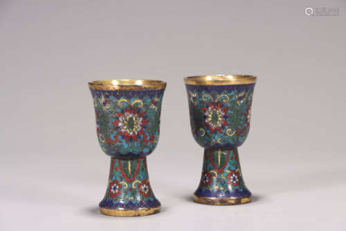 A pair of interlocking flower patterned cloisonne cups