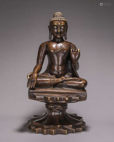 A copper silver-inlaid Sakyamuni buddha statue