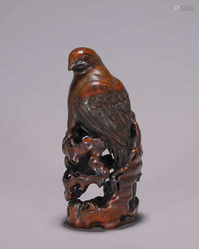 A bamboo carved bird ornament